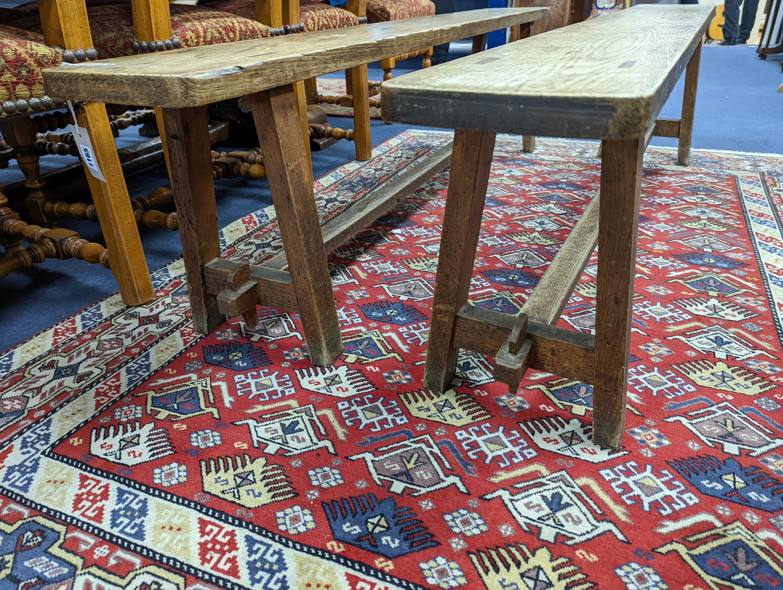 A pair of 19th century French provincial oak bench seats, length 170cm, depth 22cm, height 44cm